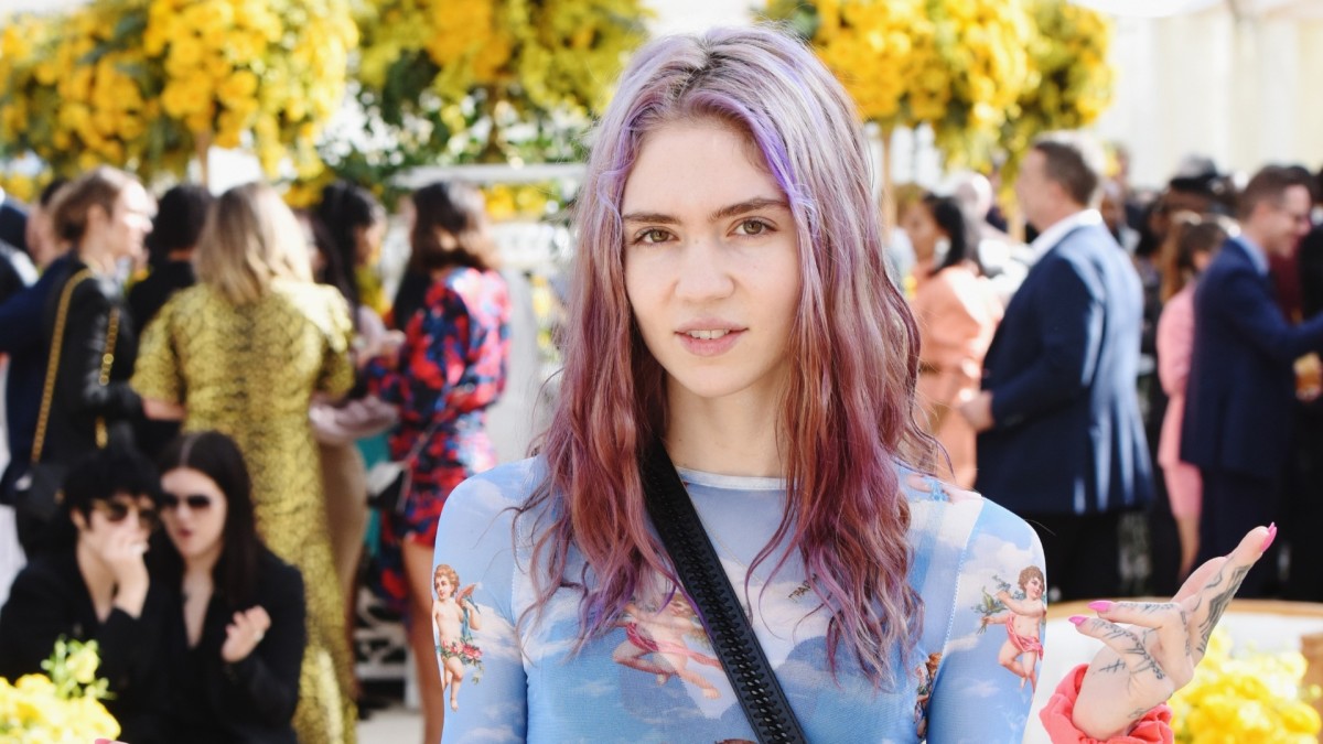 Grimes Breaks Down Inspiration Behind 'Global Warming Is Good' Billboard Campaign - Complex