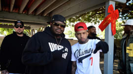 Lee 'Q' Odenat and recording artist Kid Ink attend WorldStarHipHop's 3rd Annual Skid Row Xmas