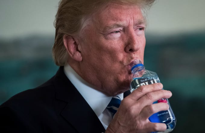 Image result for trump drinking fiji