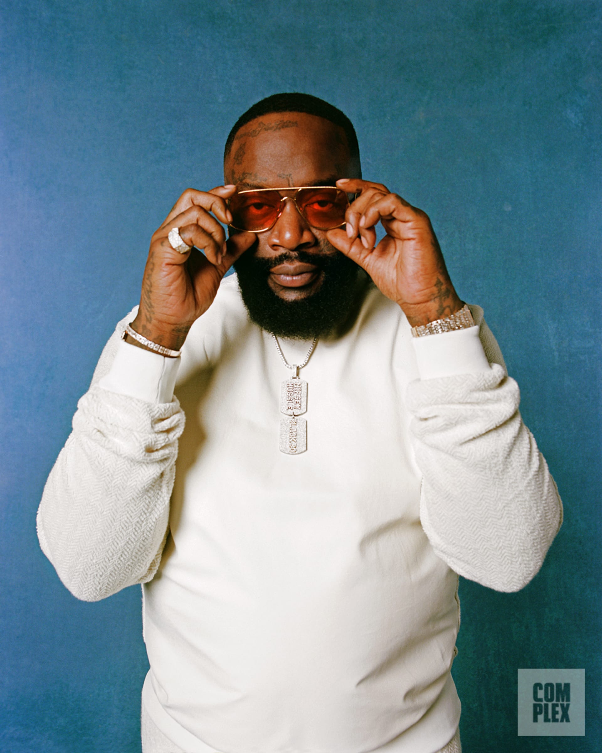 Rick Ross poses for his Complex interview