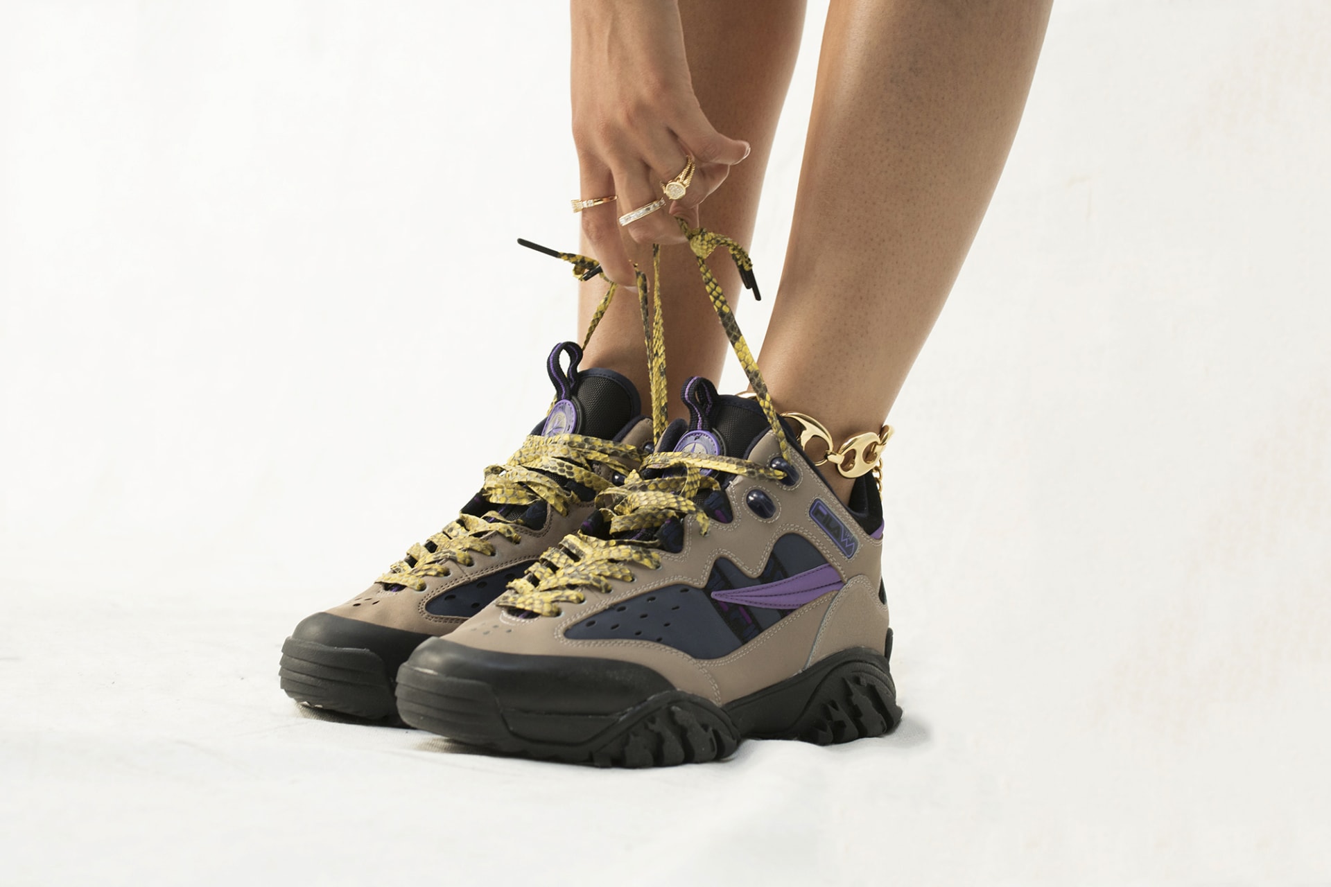 tema Seducir bandera How to Accessorize Your Chunky Sneakers featuring the FILA Fixture | Complex