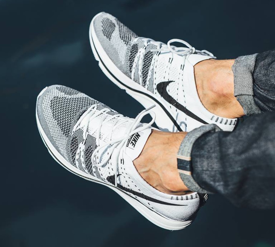 flyknit trainer black and white