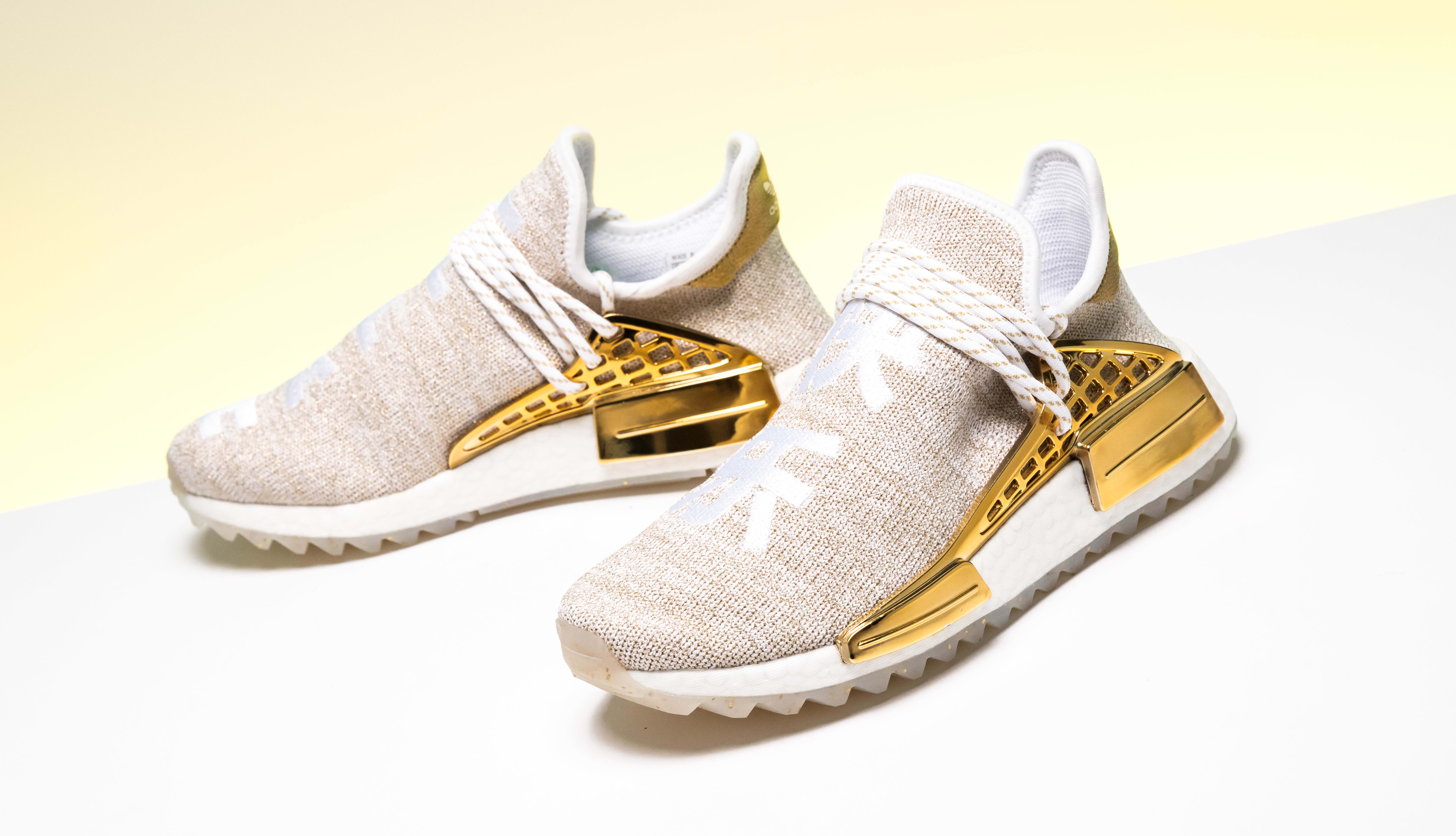 adidas nmd human race gold