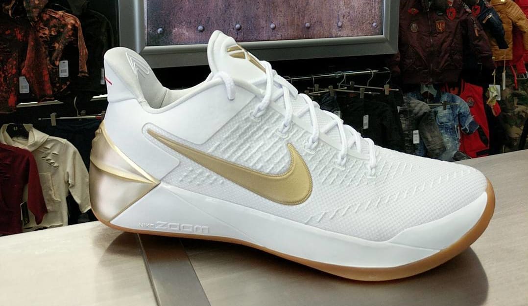 kobe ad gold white