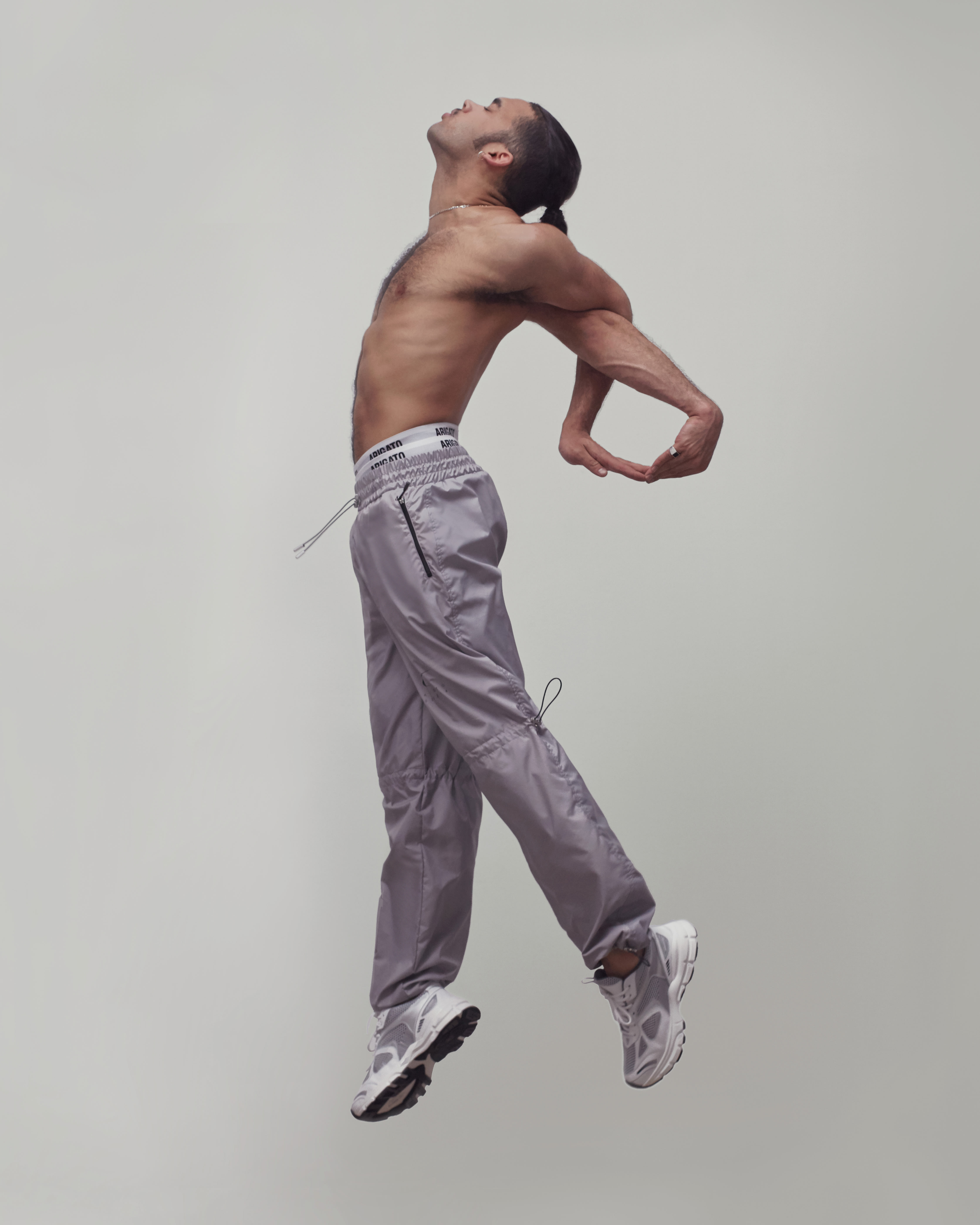 axel arigato track pants