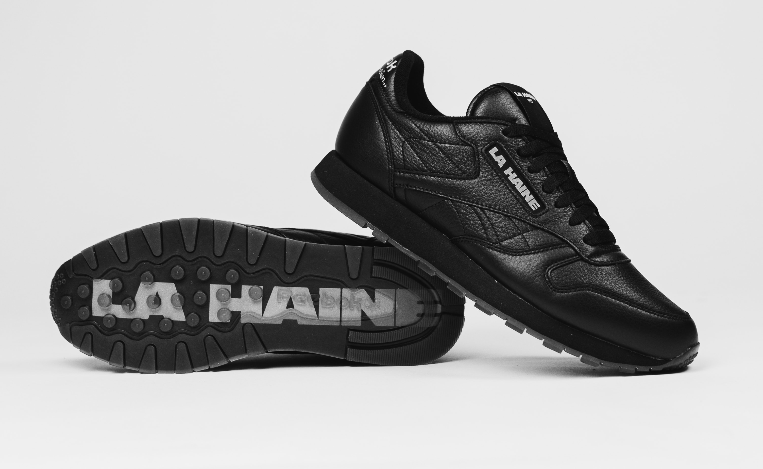 all black reebok classics