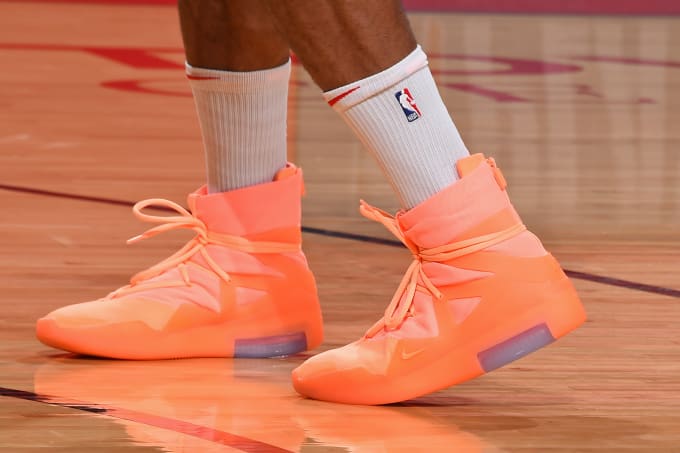 air fear of god 1 orange pulse on feet